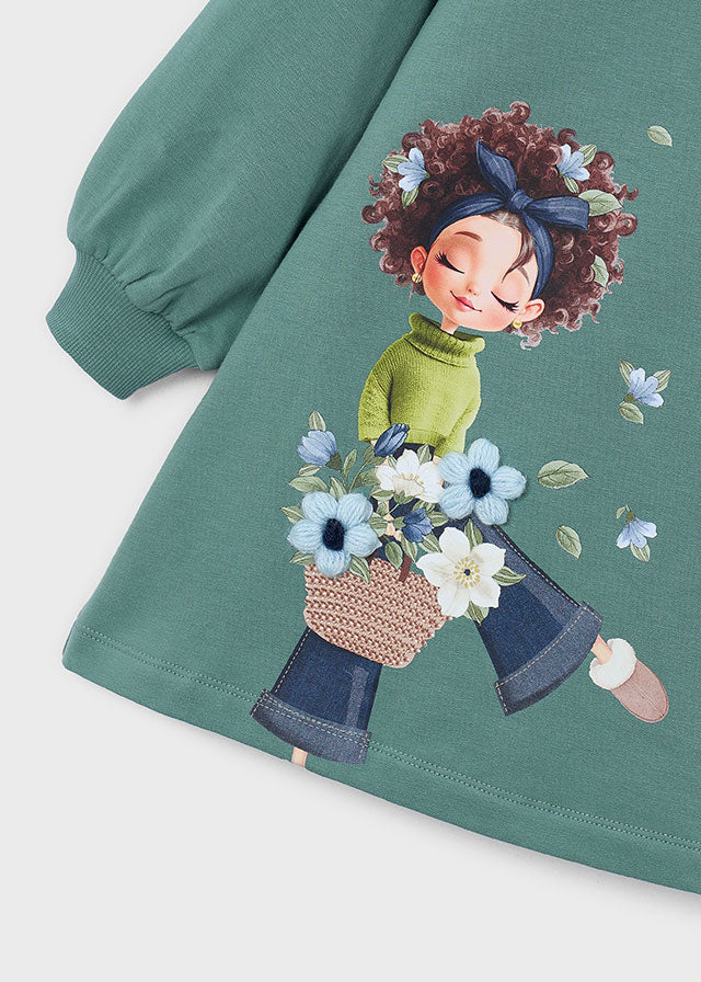 Dettaglio della stampa floreale sul vestito bambina Mayoral verde salvia