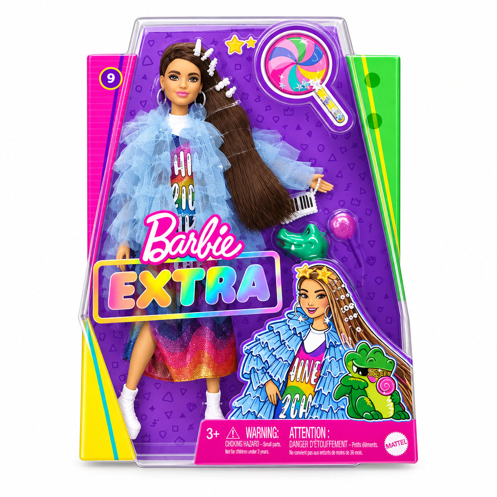 Barbie Extra n. 9 GYJ78 con capelli castani, vestito arcobaleno e giacca azzurra.