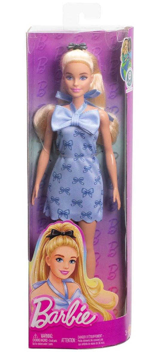 Bambola Barbie con vestito azzurro decorato con fiocchi e scarpe coordinate