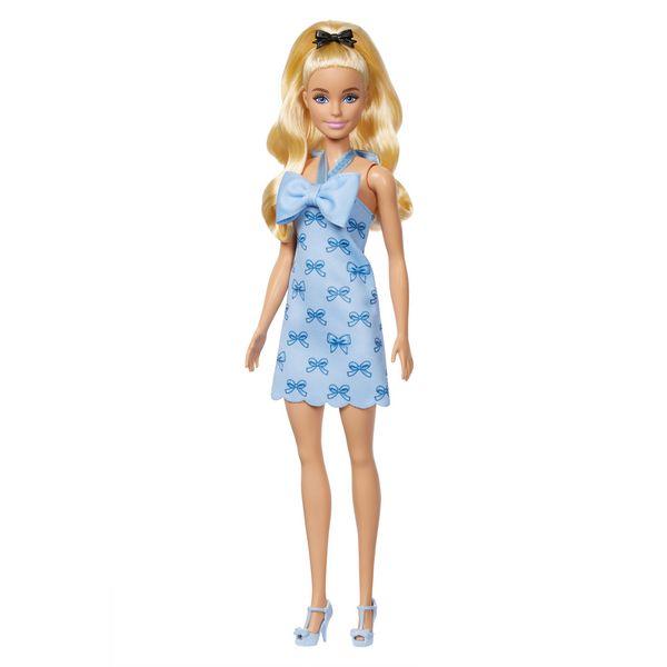 Bambola Barbie con vestito azzurro decorato con fiocchi e scarpe coordinate