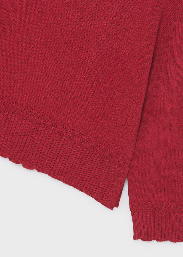 Dettaglio del bordo a coste del maglione bambina Mayoral rosso