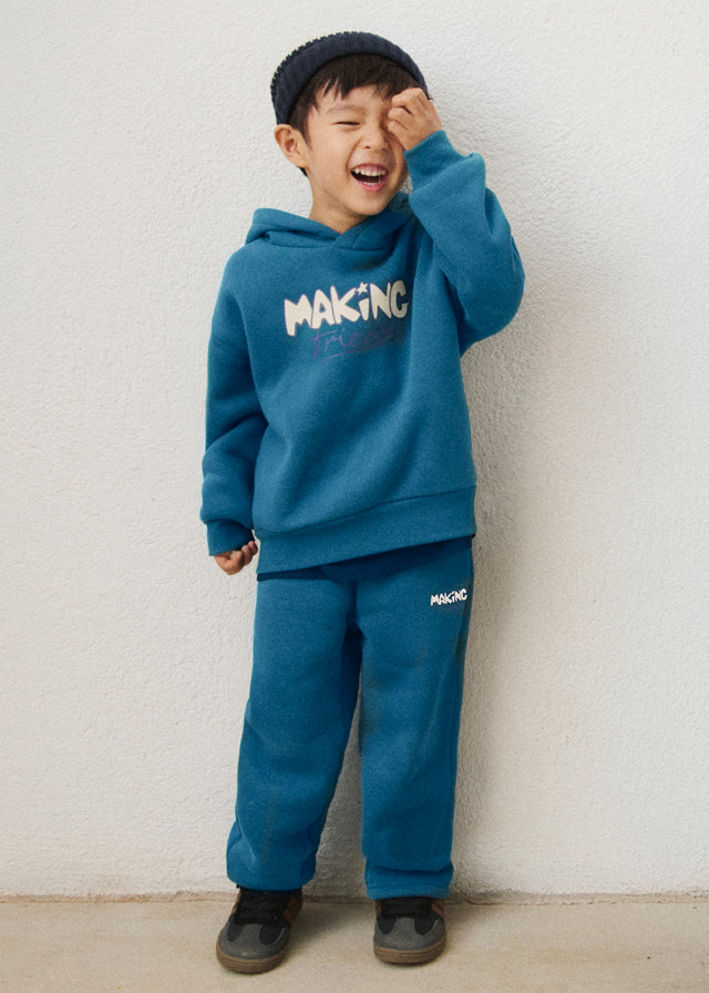 Pantalone tuta bambino Mayoral blu petrolio con stampa Making Friends