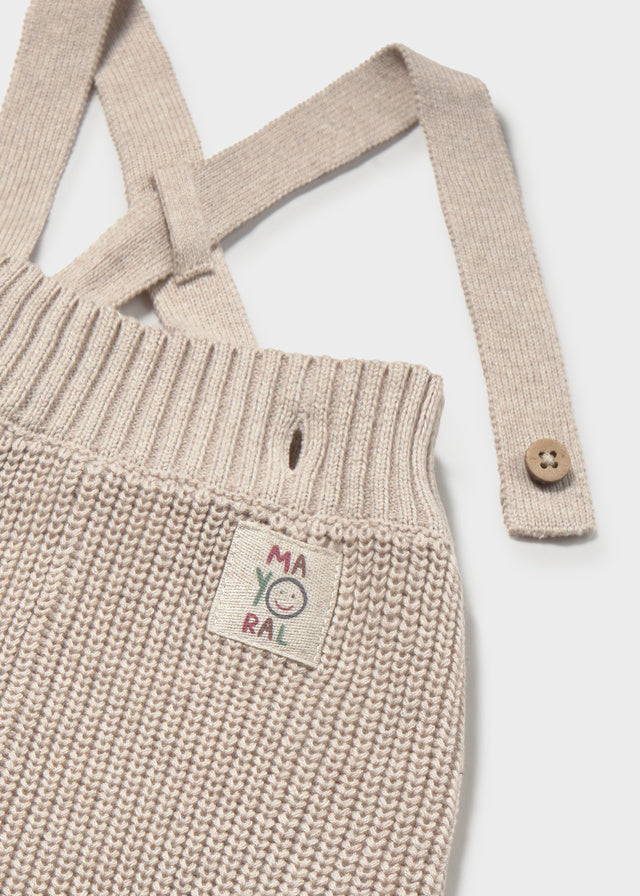 pantalone neonato Mayoral in maglia beige con bretella e bottone in legno